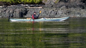 Sondre paddling on glass, Hanson Island