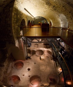 Roman winery, showing the large ceramic vessels used for aging (lower floor) below the 13th century palace