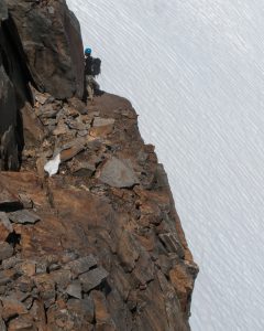 Jocelyn scouts the route along the ridge